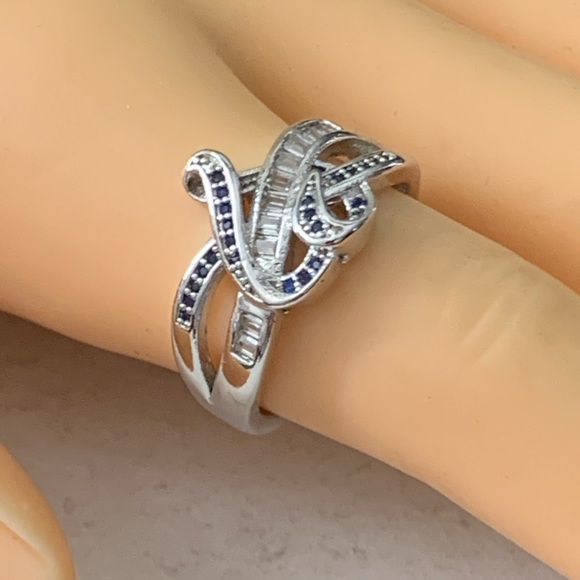 Enhanced Blue Sapphire And Cubic Zirconia Accent Swirled Heart Ring in Sterling - Picture 12 of 13